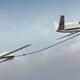 Illustration for article titled The Future Of Aerial Refueling Includes Stabilized Drogues And No Humans